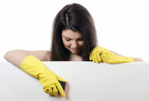 Professional cleaner handling kitchen domestic cleaning in Westhampstead